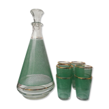 vintage digestive decanter and its matching glasses