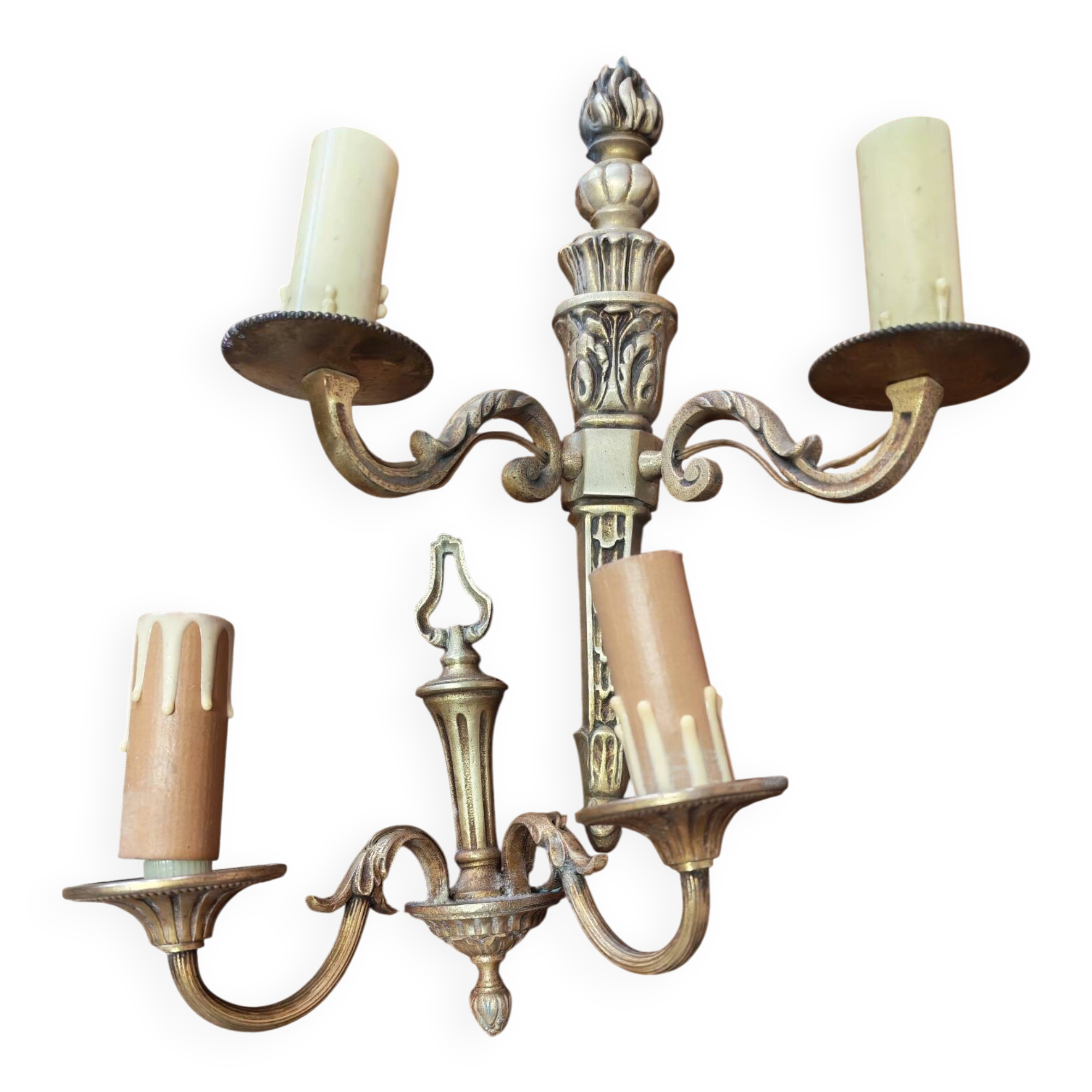 Two antique wall sconces in gilded bronze in the Louis XVI style.