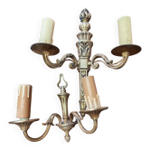 Two antique wall sconces in gilded bronze in the Louis XVI style.
