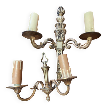 Two antique wall sconces in gilded bronze in the Louis XVI style.