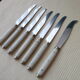 Set of 6 cheese knives and 1 Vintage Bakelite serving knives