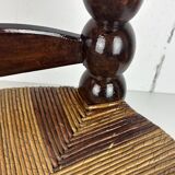 Brutalist wood turned bobbin low rush chair n the style of Charles Dudouyt