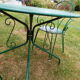 Wrought iron garden lounge table and 2 armchairs