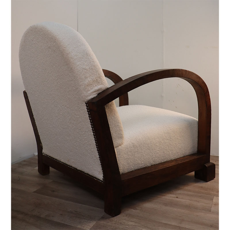 Pair of modernist armchairs in wood and buckle fabric, 1940