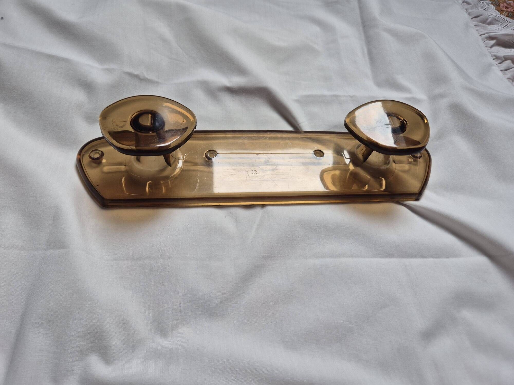 vintage translucent brown coat rack