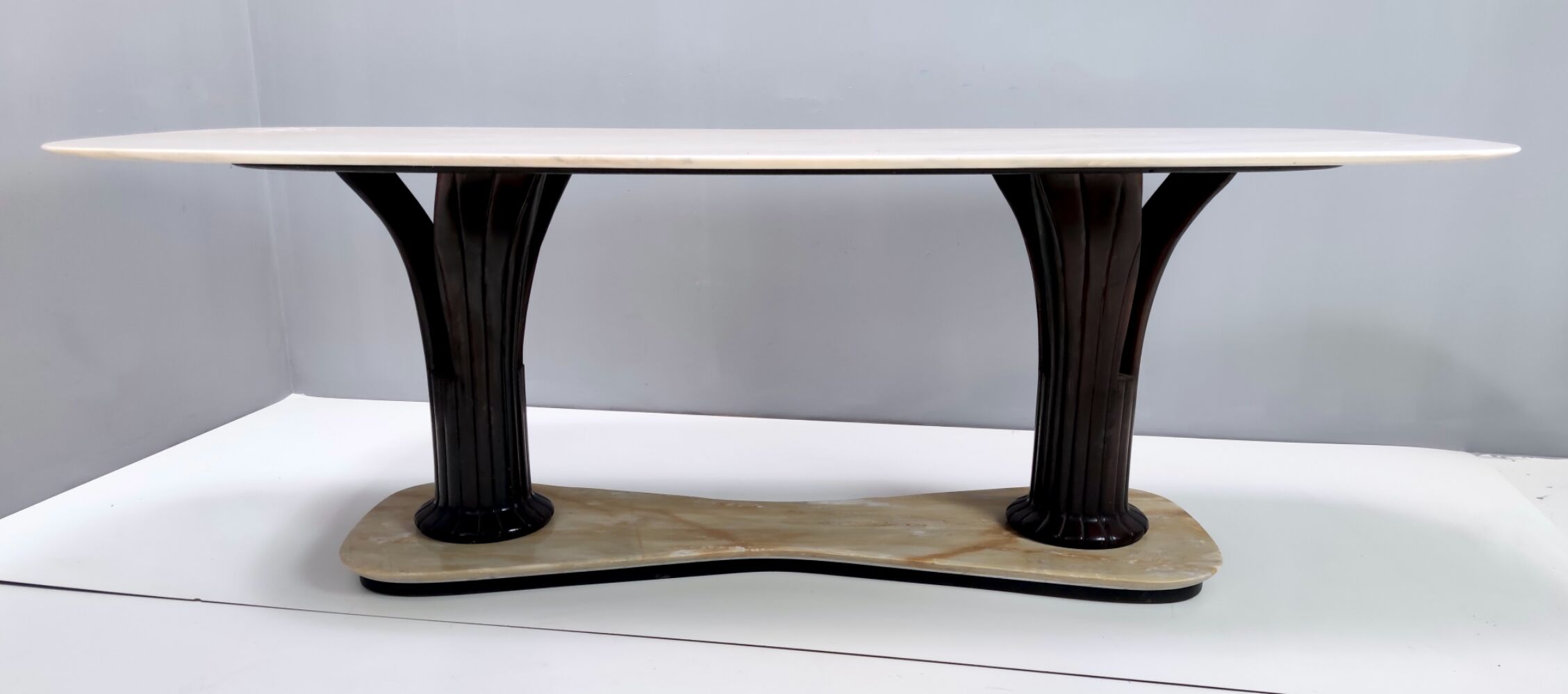 Dining table with a portuguese pink marble top