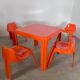 Table and 4 chairs in orange fiberglass design from the 70s Patrick Gingembre Paulus edition