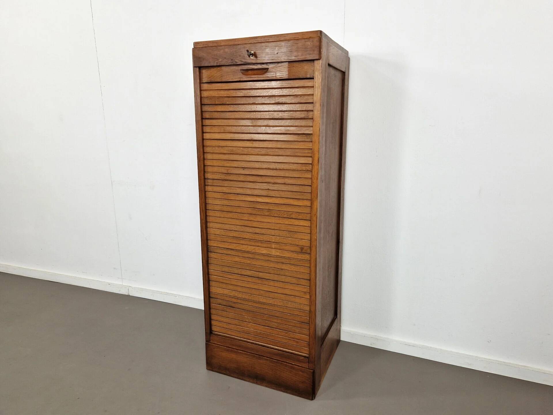Vintage large oak shutter cabinet | 1930s