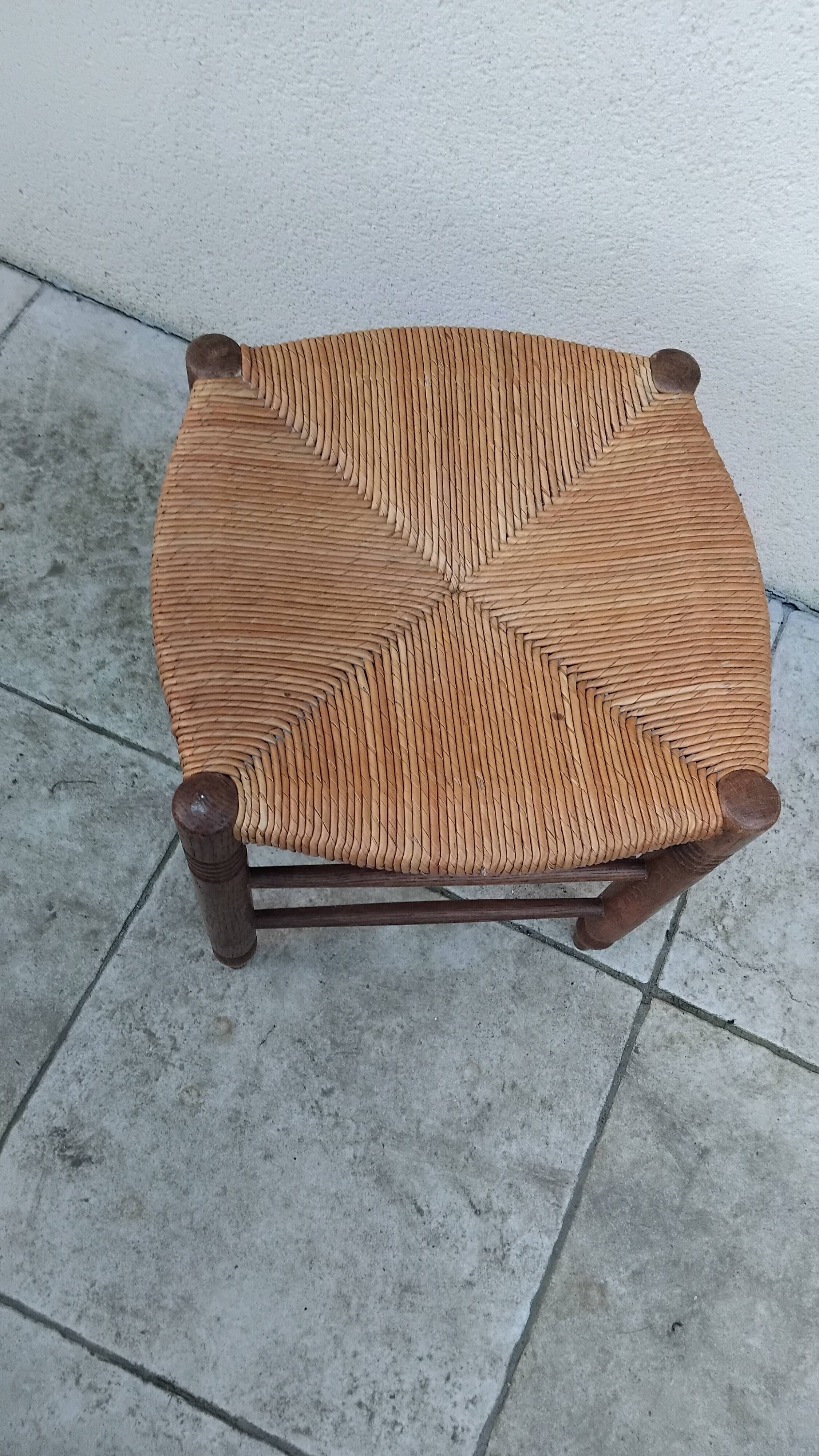 Vintage low stool with straw seat