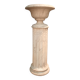 Column topped with a plaster basin.