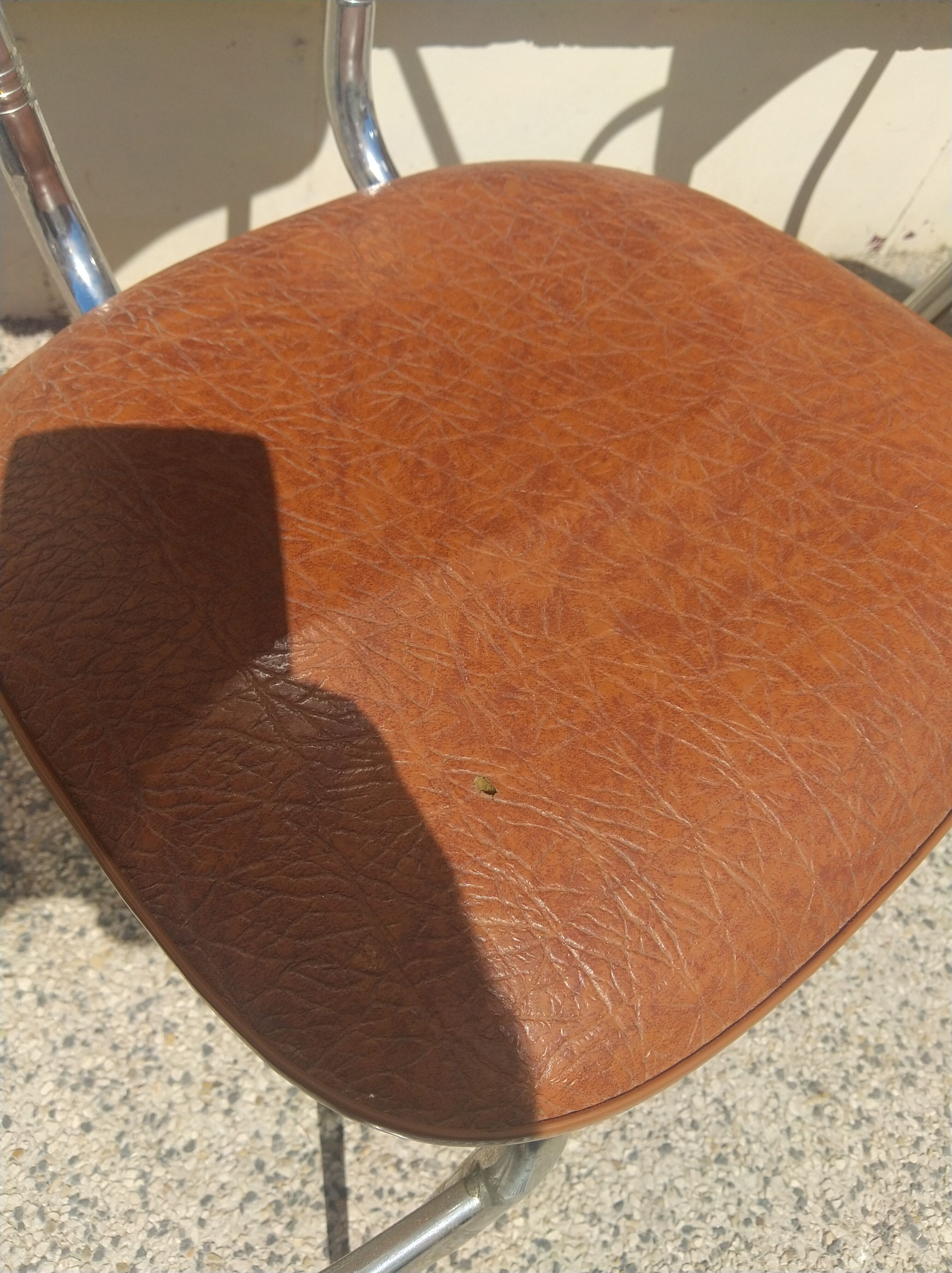 Set of 4 armchairs in chromed metal and brown imitation leather, circa 1960