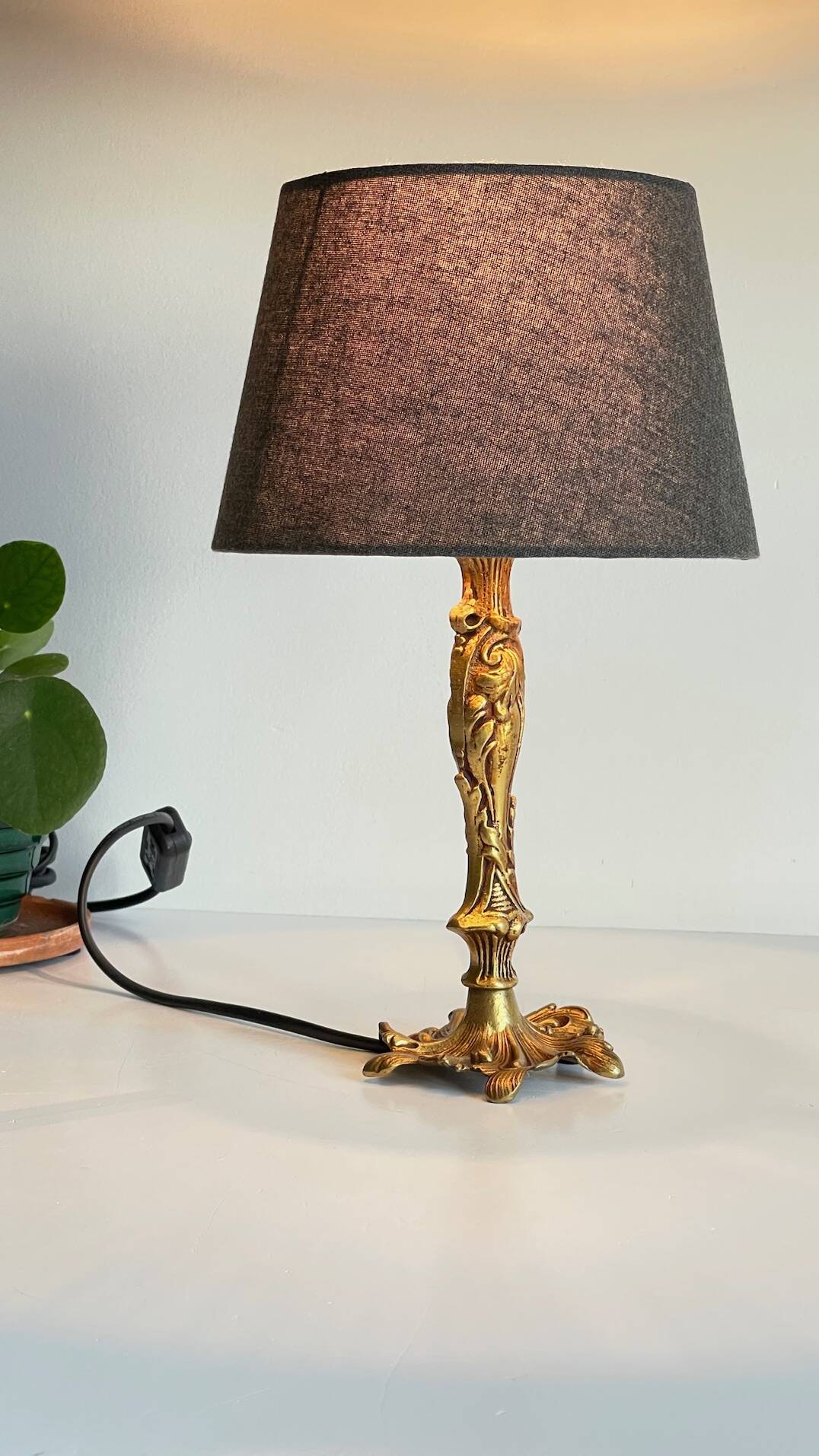 Chic bronze lamp with vintage gold patina