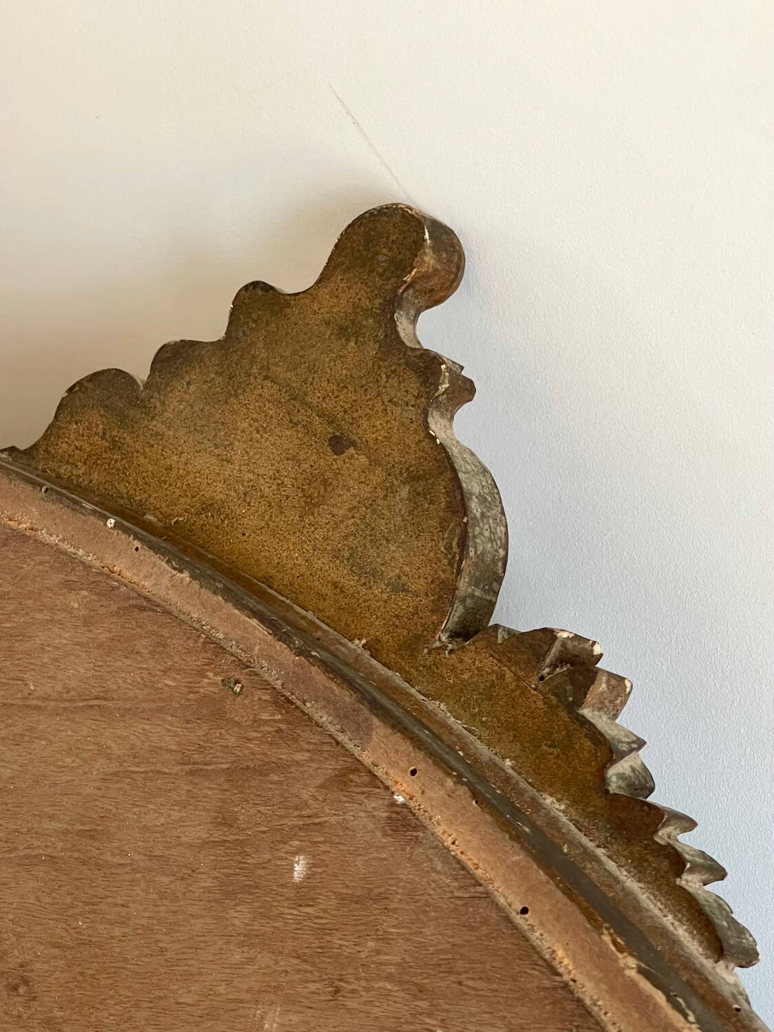 Antique oval gilt mirror.