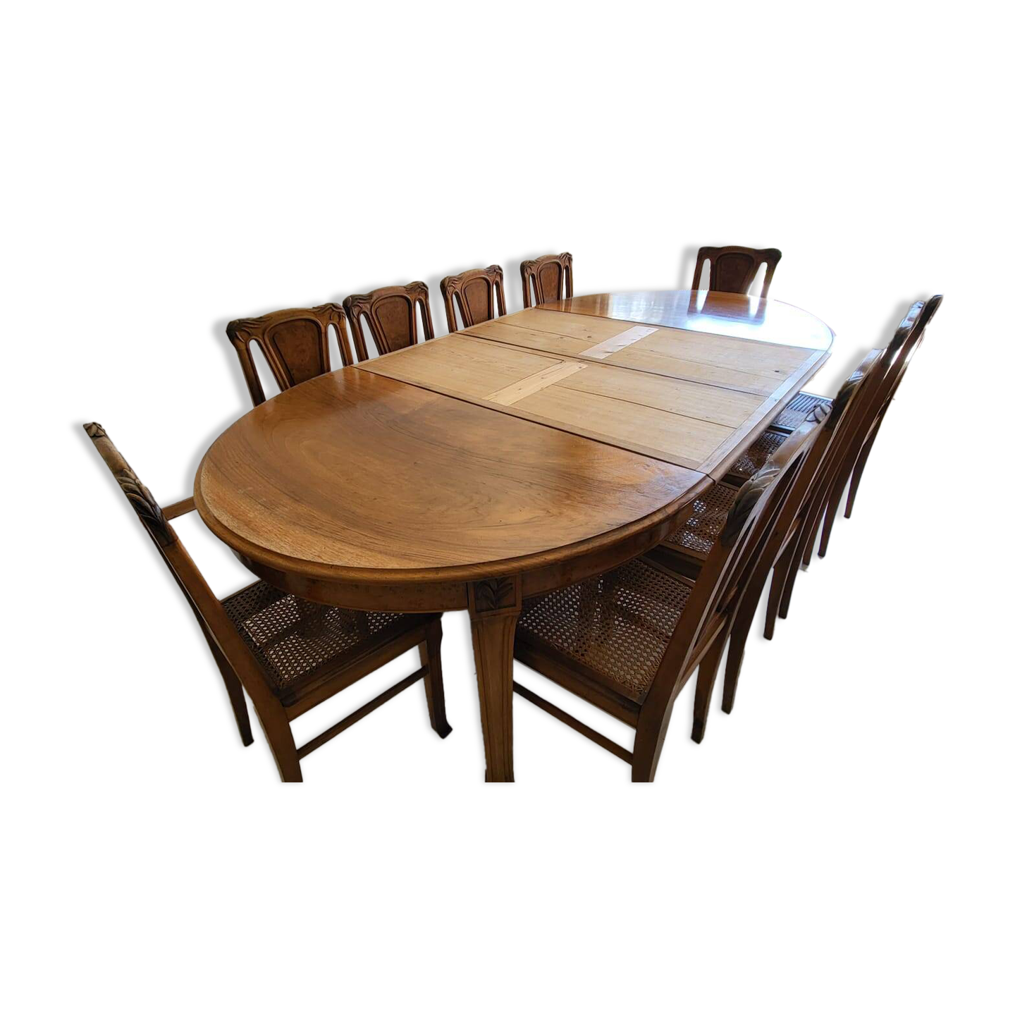 Table and 10 Art Nouveau style chairs.