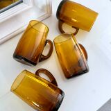 4 mugs/ mugs in vintage blown amber glass