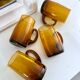 4 mugs/ mugs in vintage blown amber glass