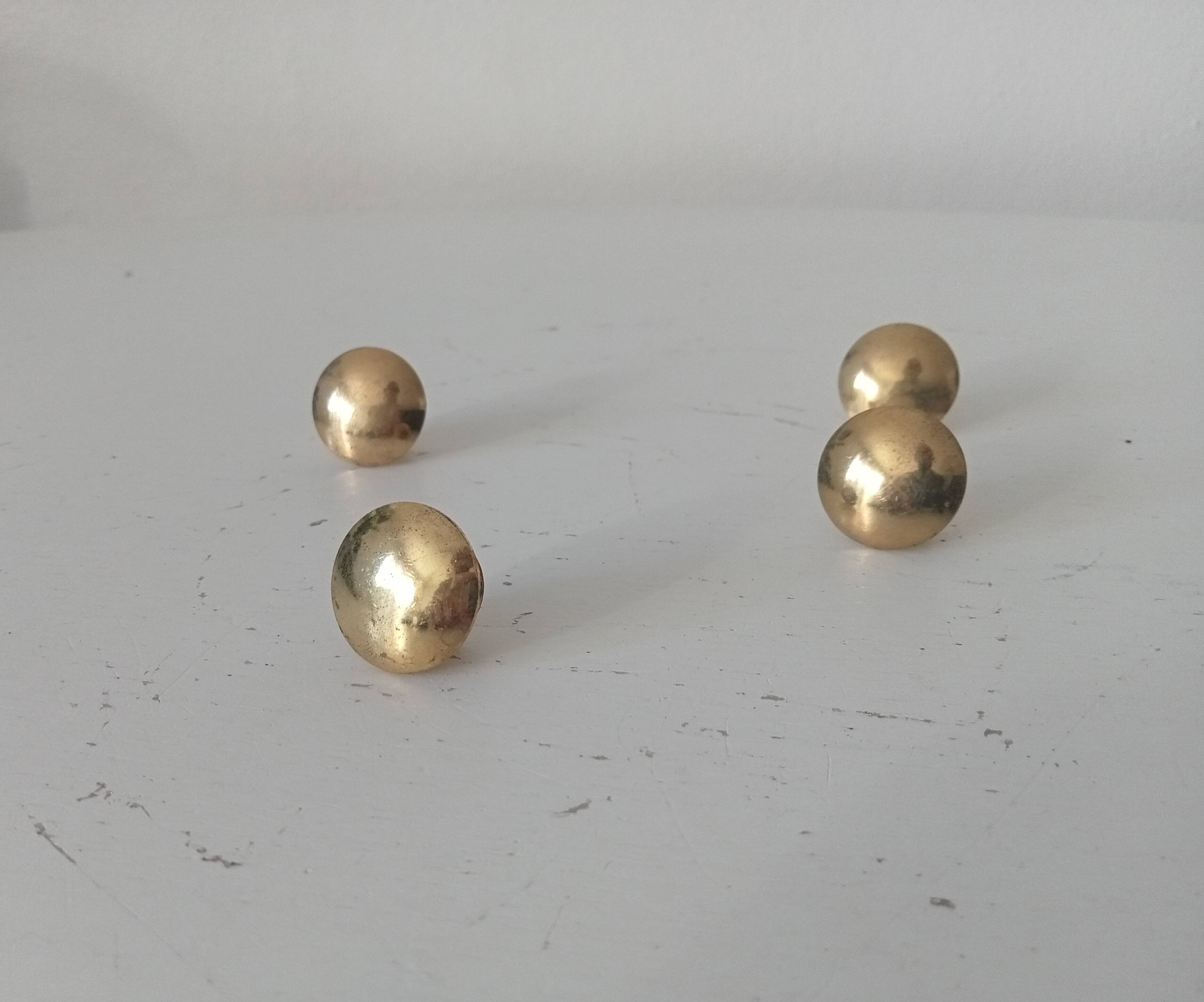 Pair of vintage brass "lens" knobs/furniture handles