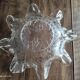 Cup, empty pockets in voluted molded glass decoration stars
