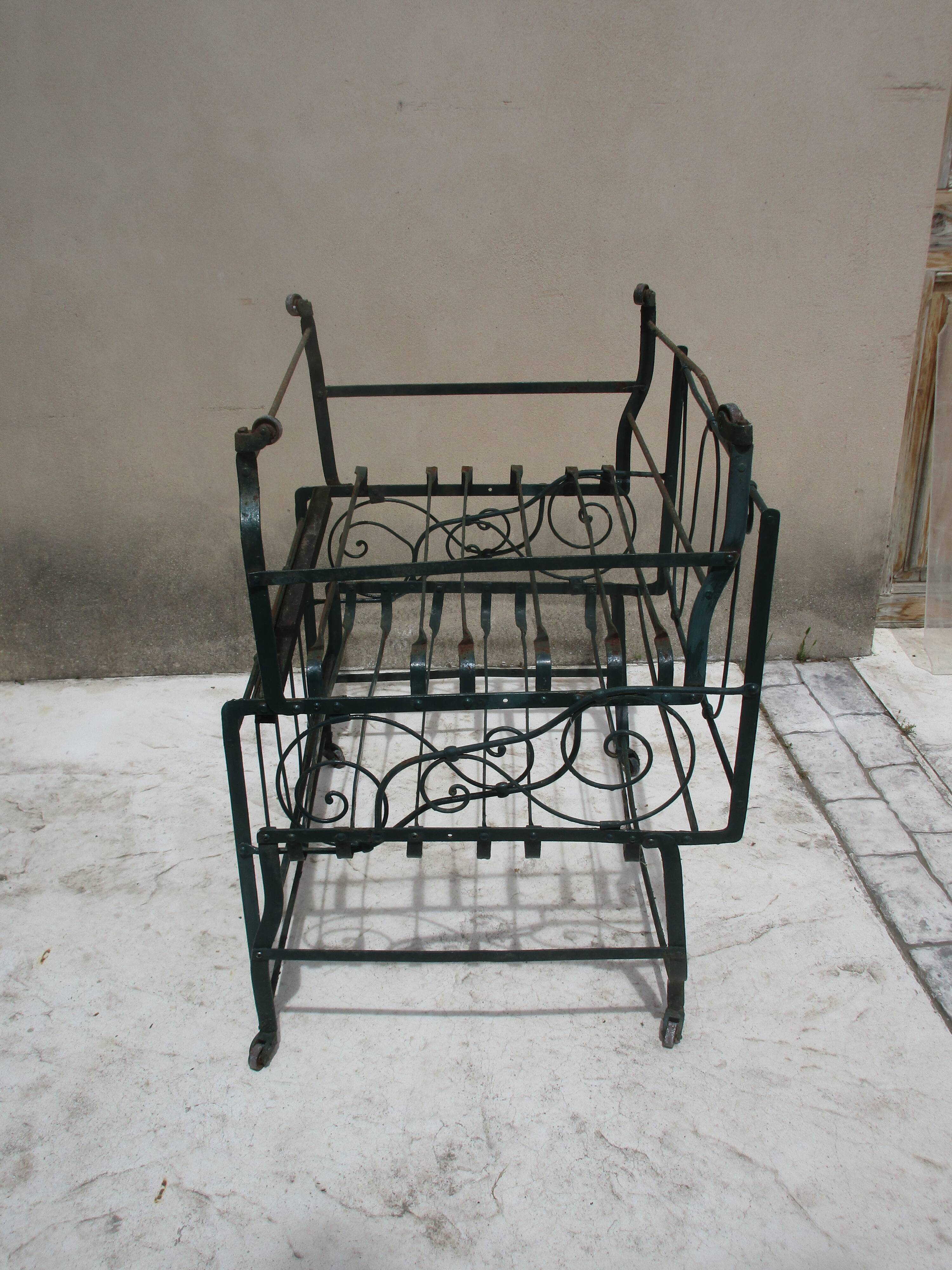 Pair of iron garden chairs forge