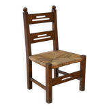 Children's wooden chair with straw seat