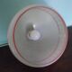 Space age pendant lamp, white opaline with orange silkscreened geometric designs