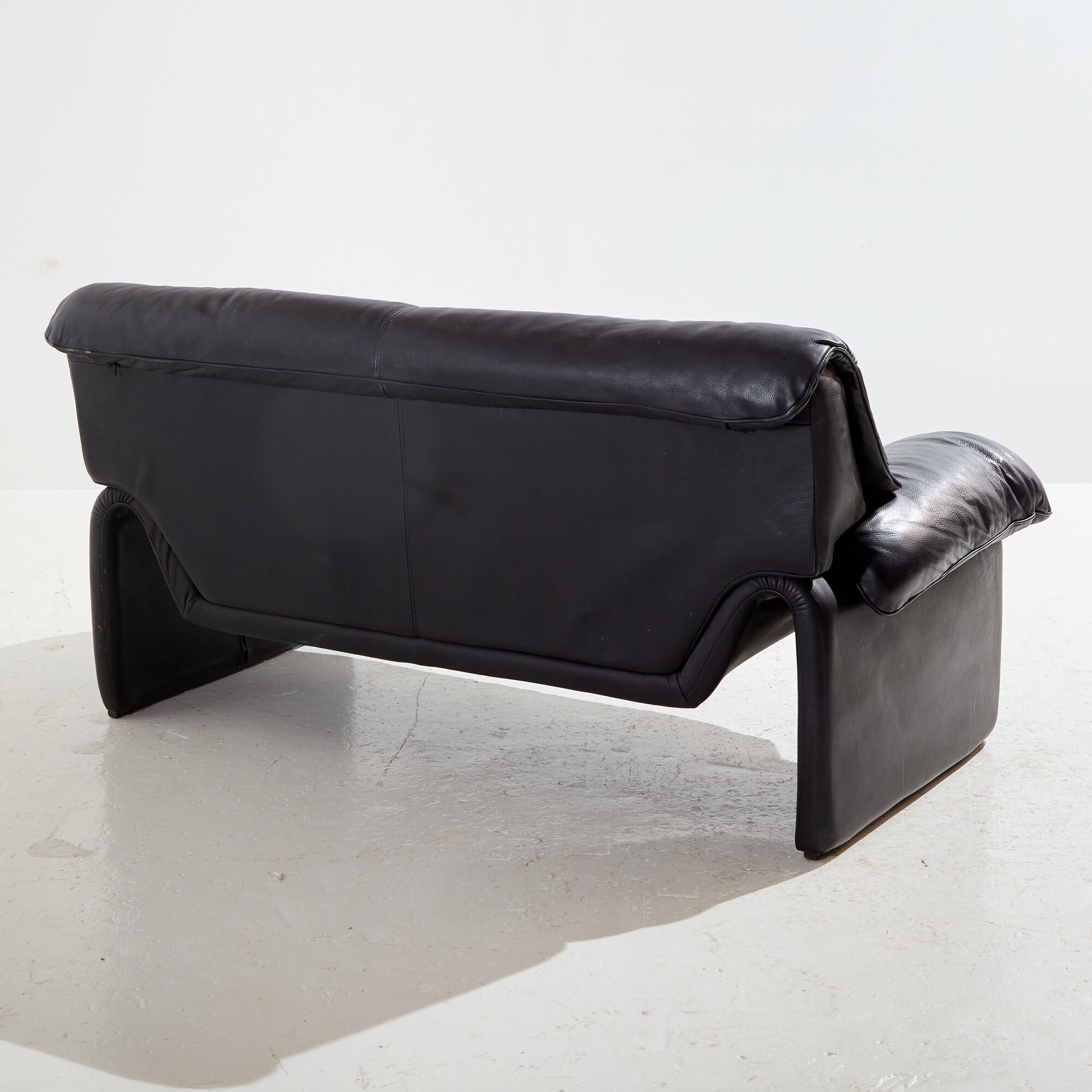 Two-seater leather sofa