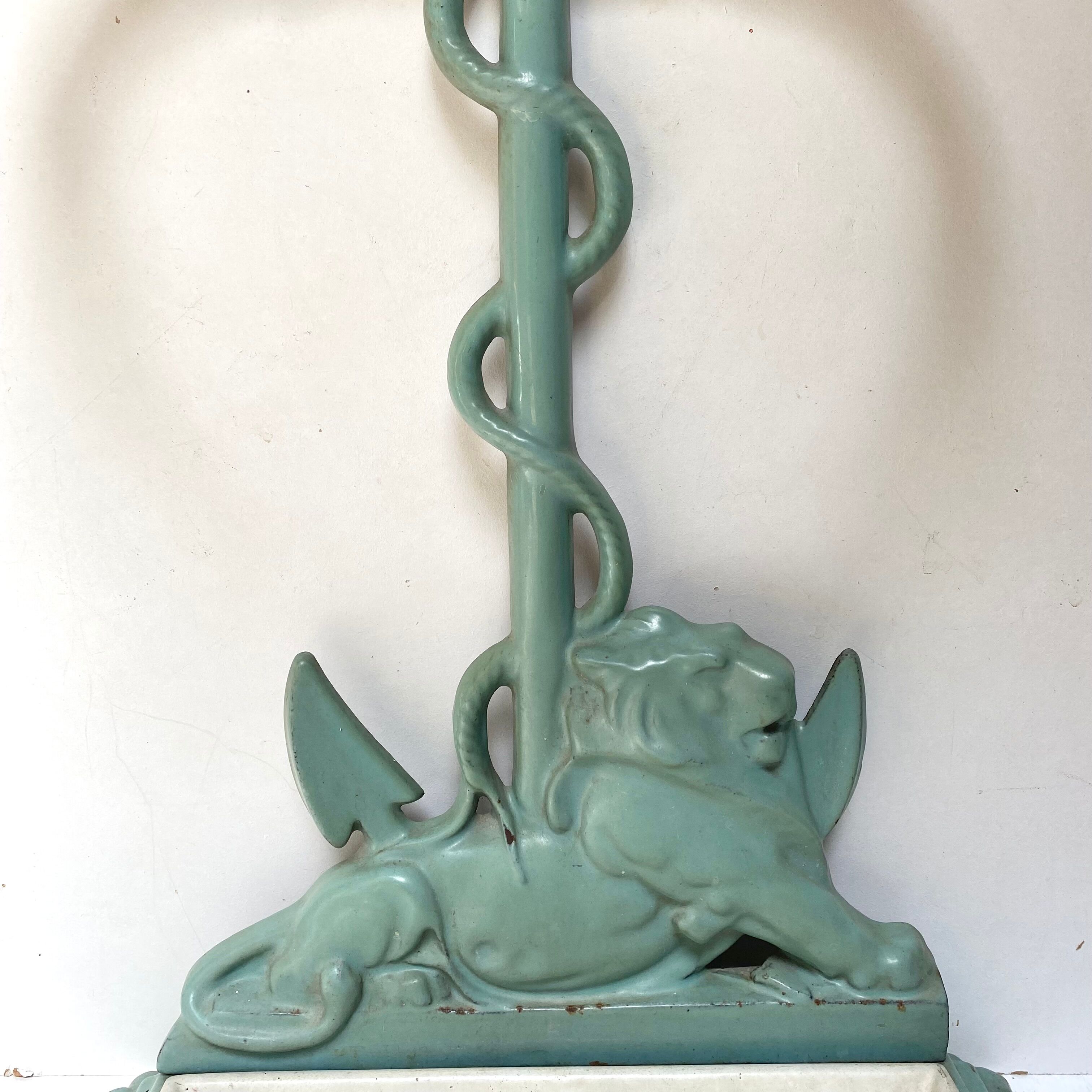 Enameled cast iron umbrella stand from the early 20th century