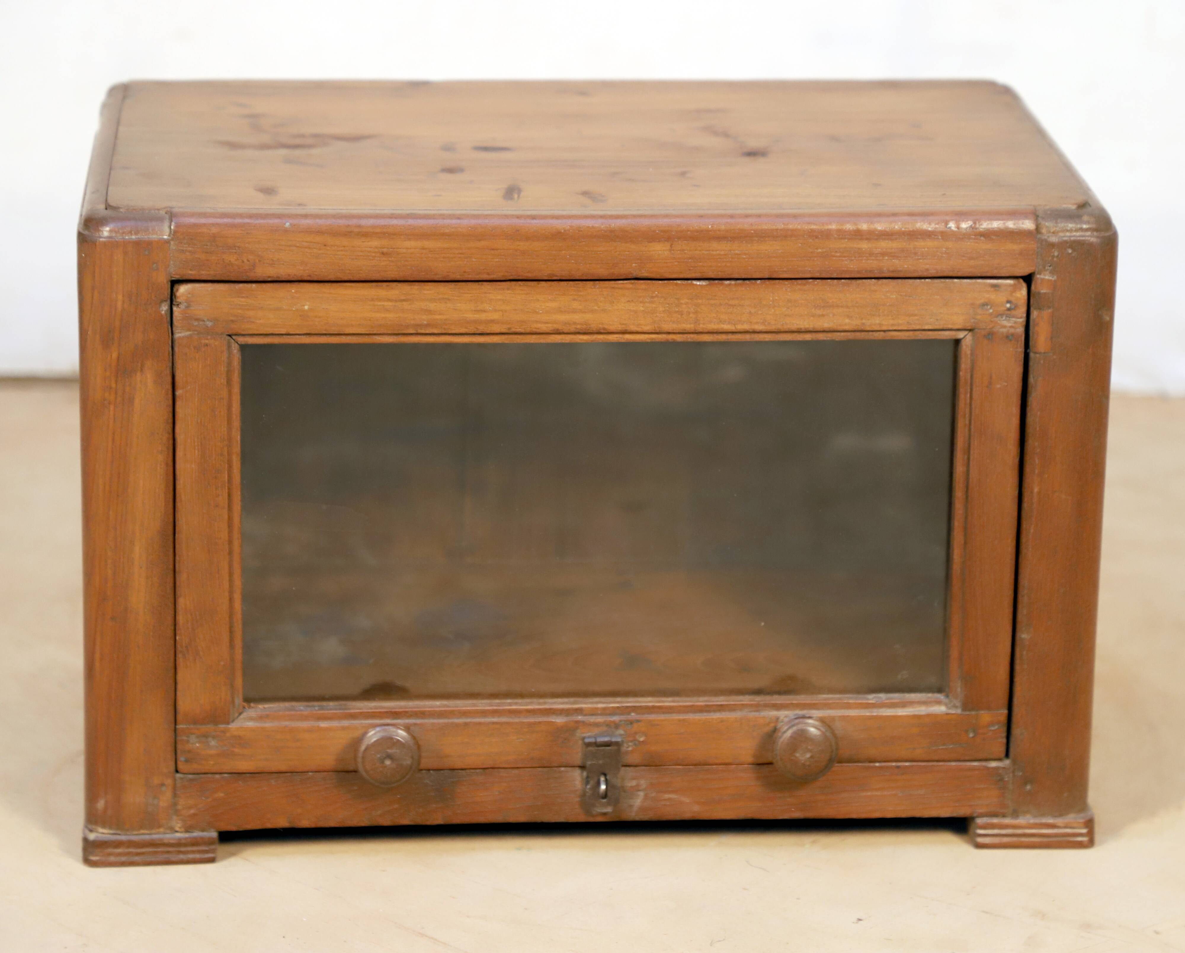 Art Deco showcase in Burmese teak
