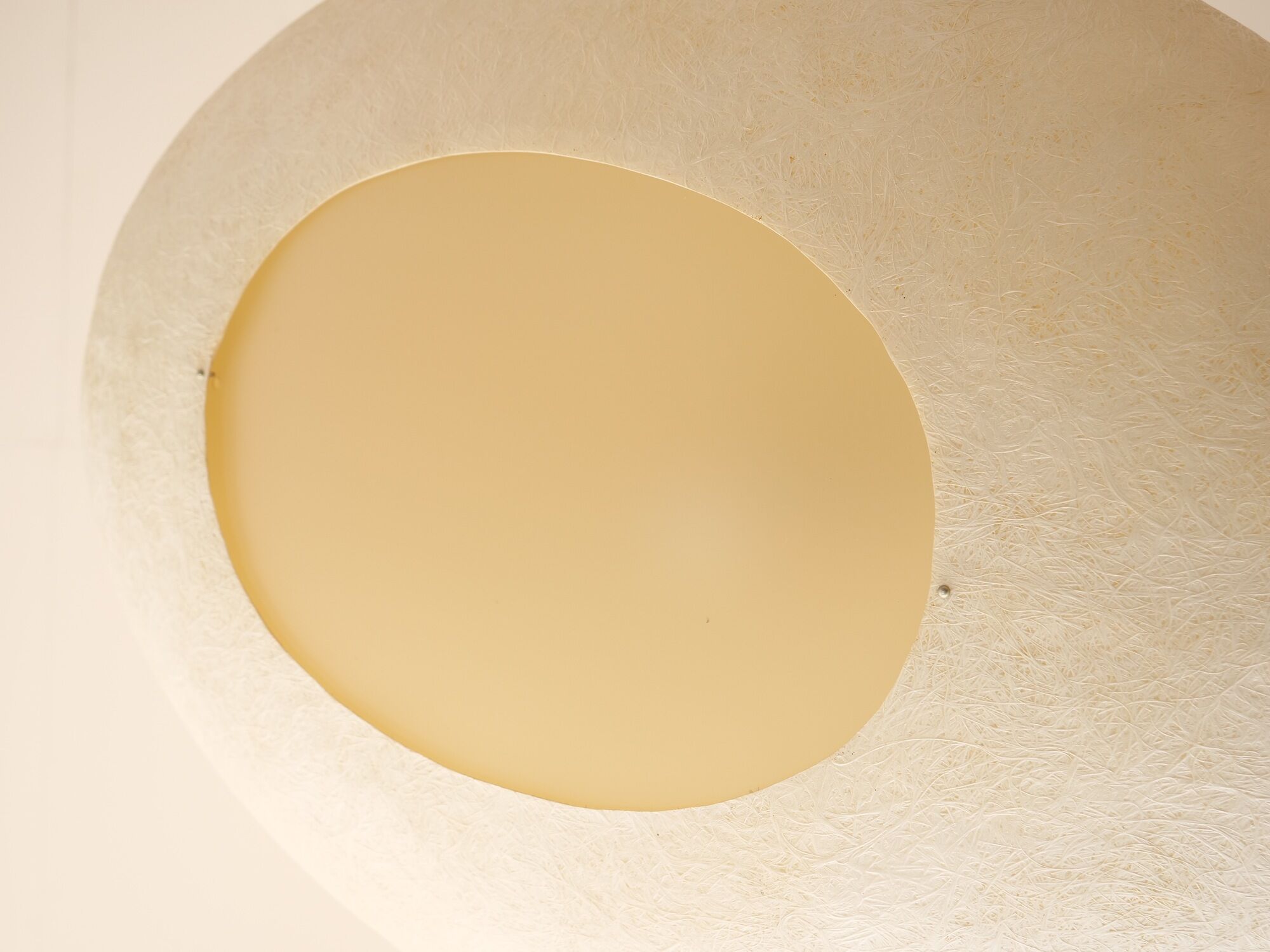 Organically shaped suspension made of ecological fibers
