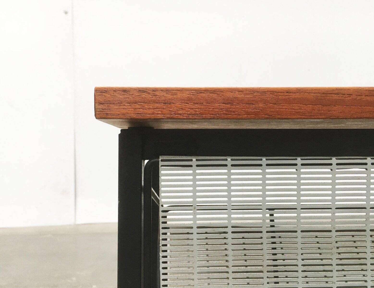 Mid-century teak side table with magazine rack.