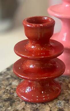 Red candlestick holder