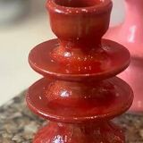 Red candlestick holder