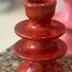 Red candlestick holder