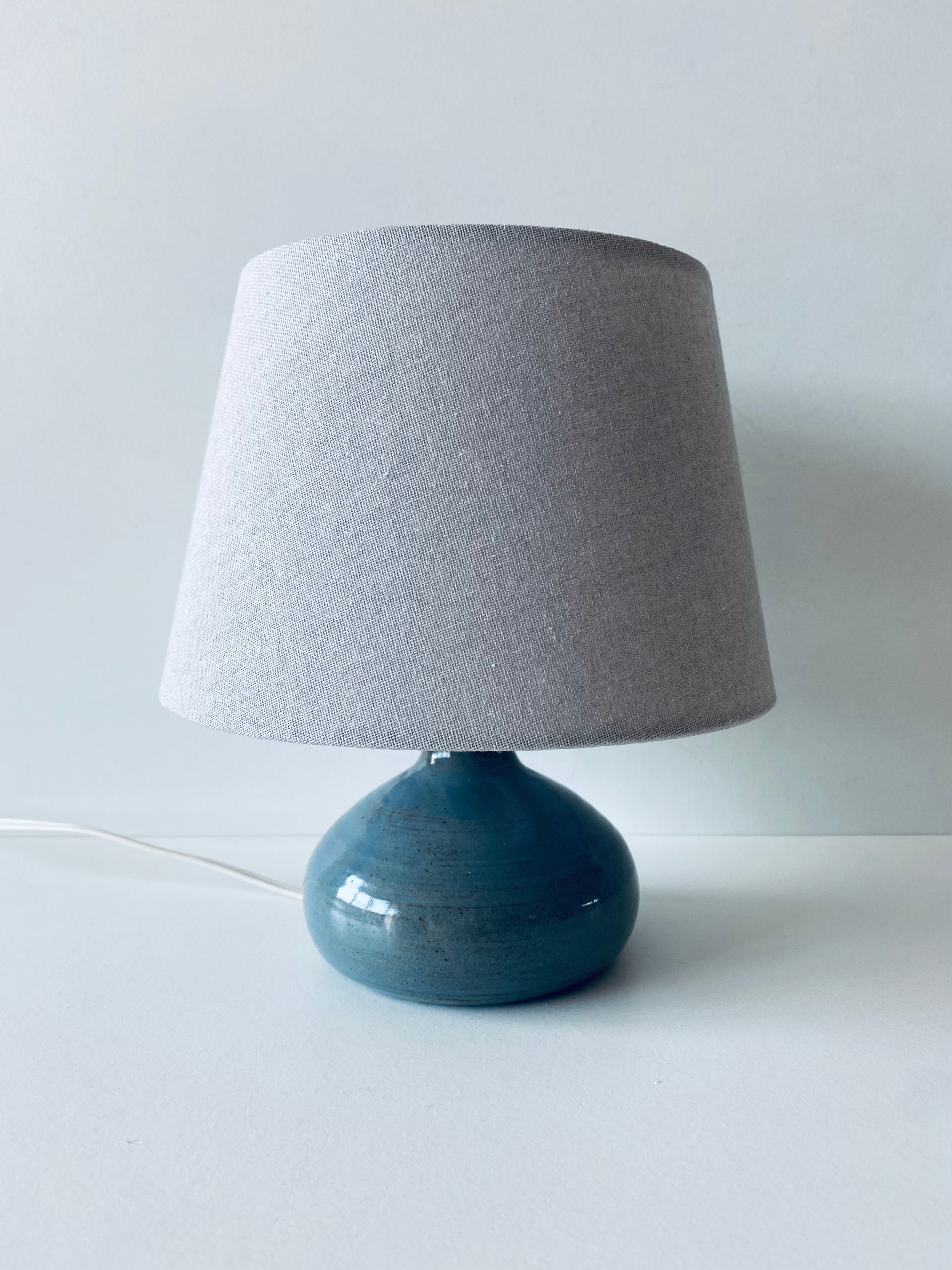 Lamp in enamelled sandstone