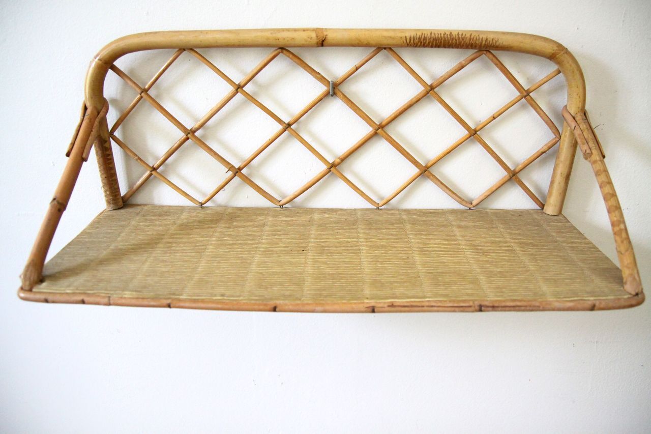 Rattan wall shelf