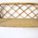 Rattan wall shelf