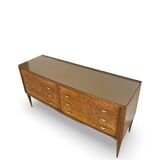 Veneered burl walnut chest of drawers with light warm brown glass top