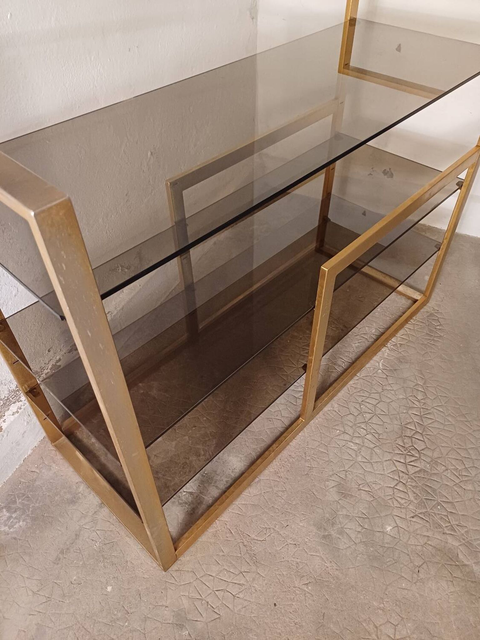 Brass shelf, smoked glass