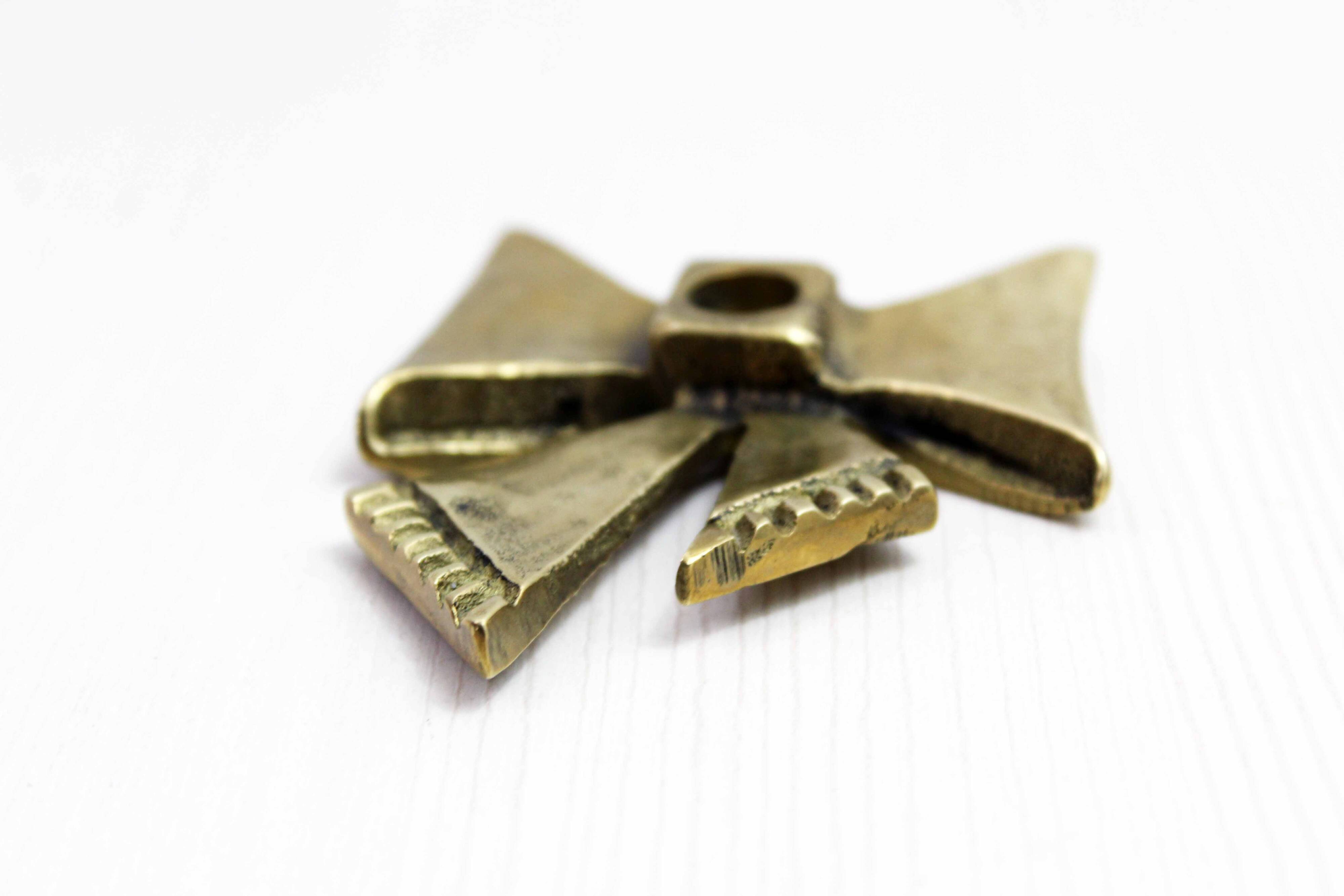 Brass bow tie candle holder 1970