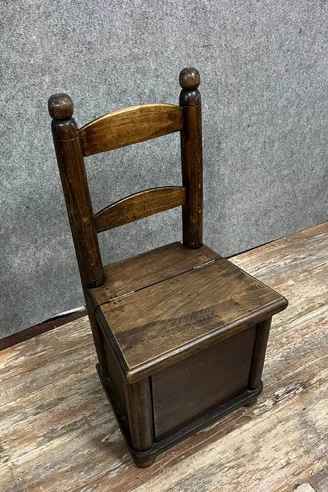 Late 18th century folk art work: child's armchair concealing a chest