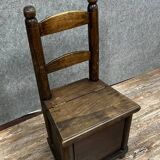 Travail d'art populaire fin XVIIIè: fauteuil d'enfant dissimulant un coffre