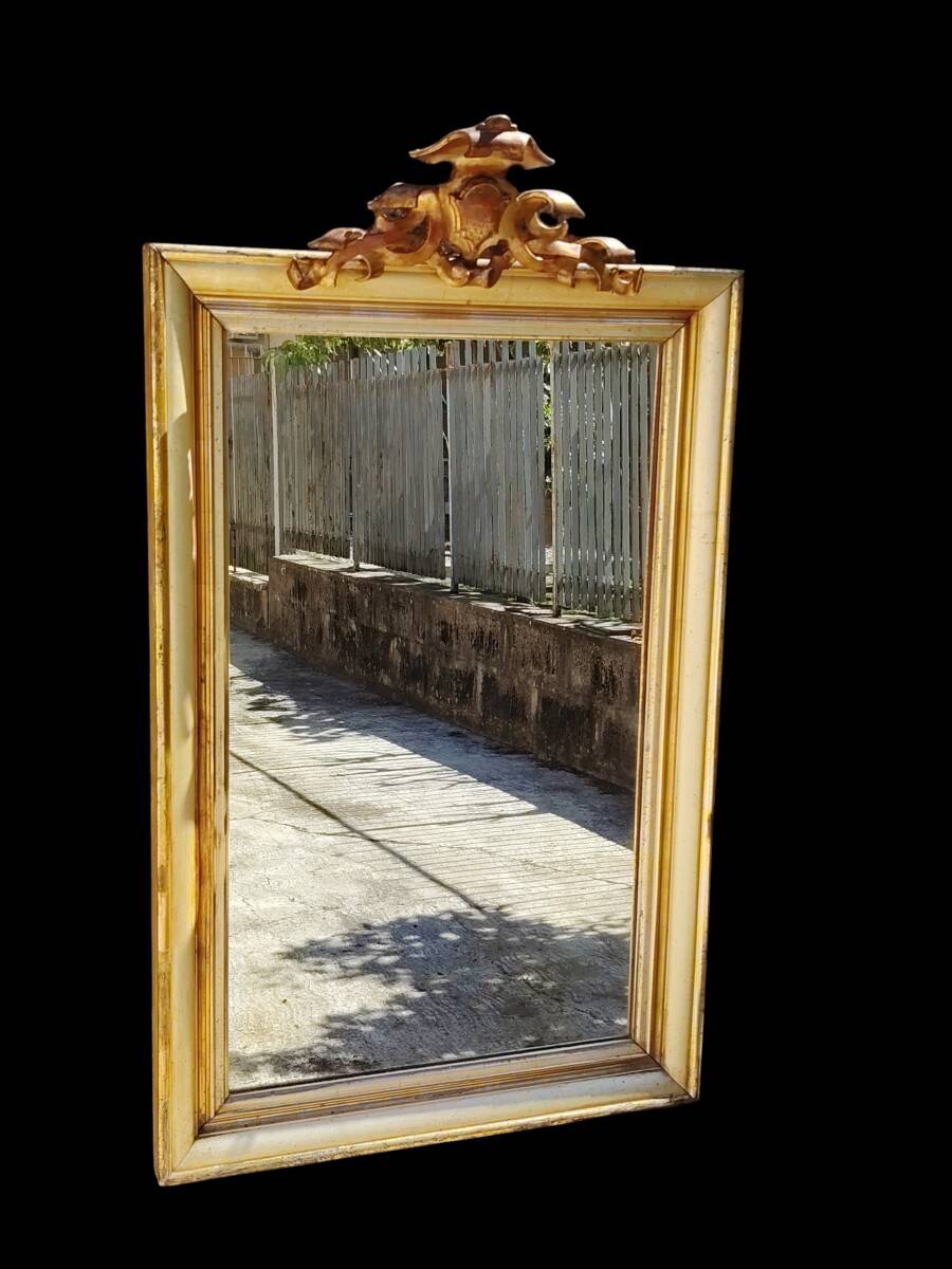 Large mirror/19th-century wooden frames, gilded.