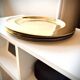 8 large dessert plates in brass