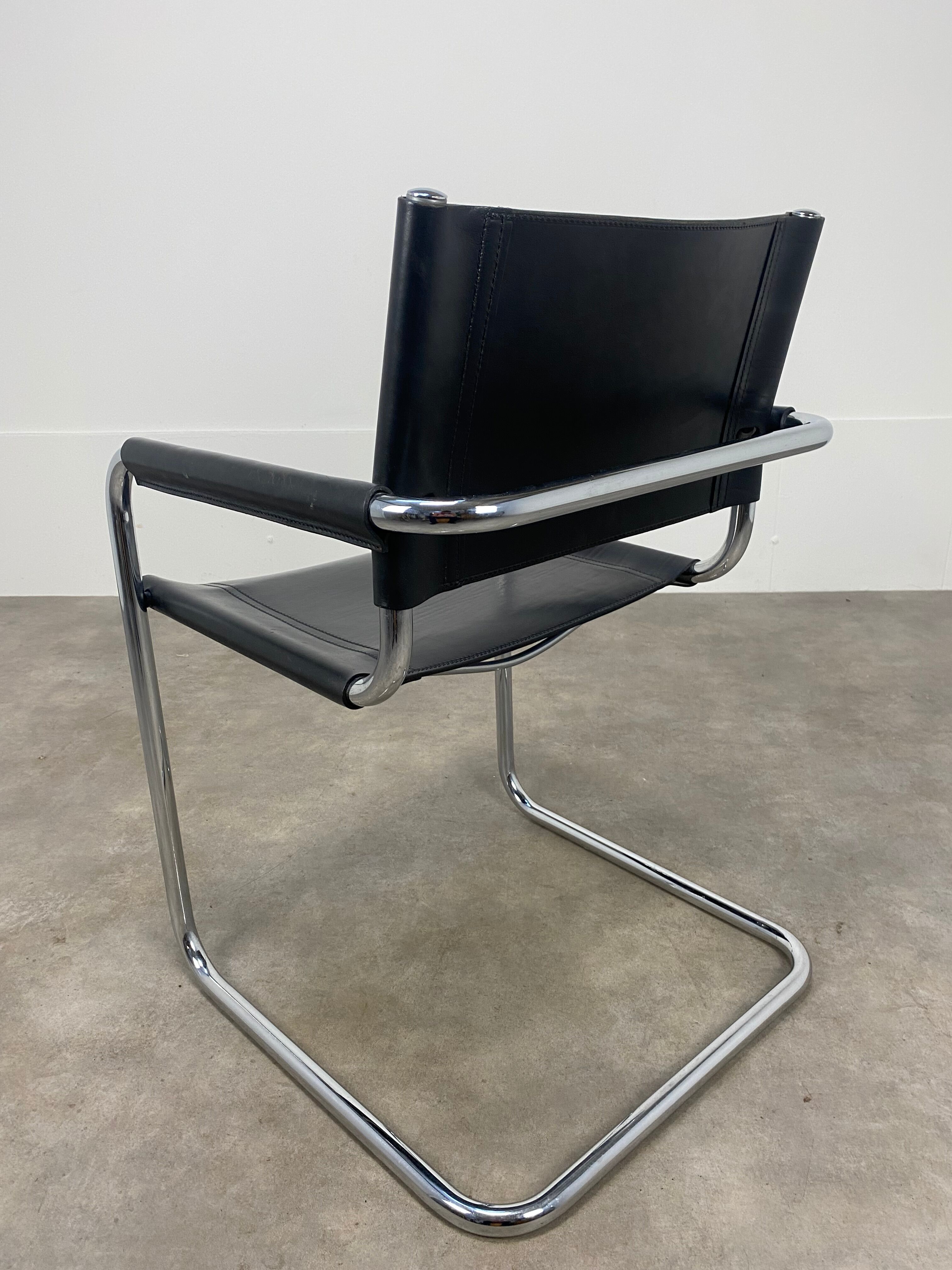 Black and chrome leather cantilever armchair