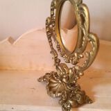 Baroque oval mirror pivoting on foot Golden brass 20x15cm