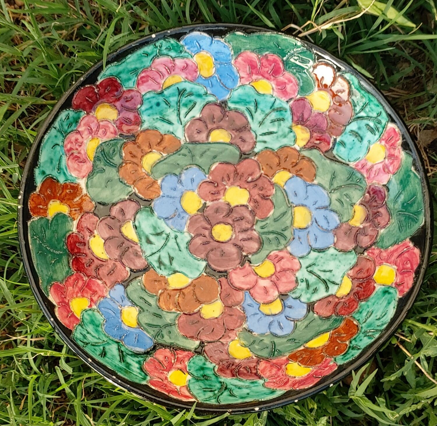 Vallauris flat Stamped numbered enamelled ?decoration of flowers