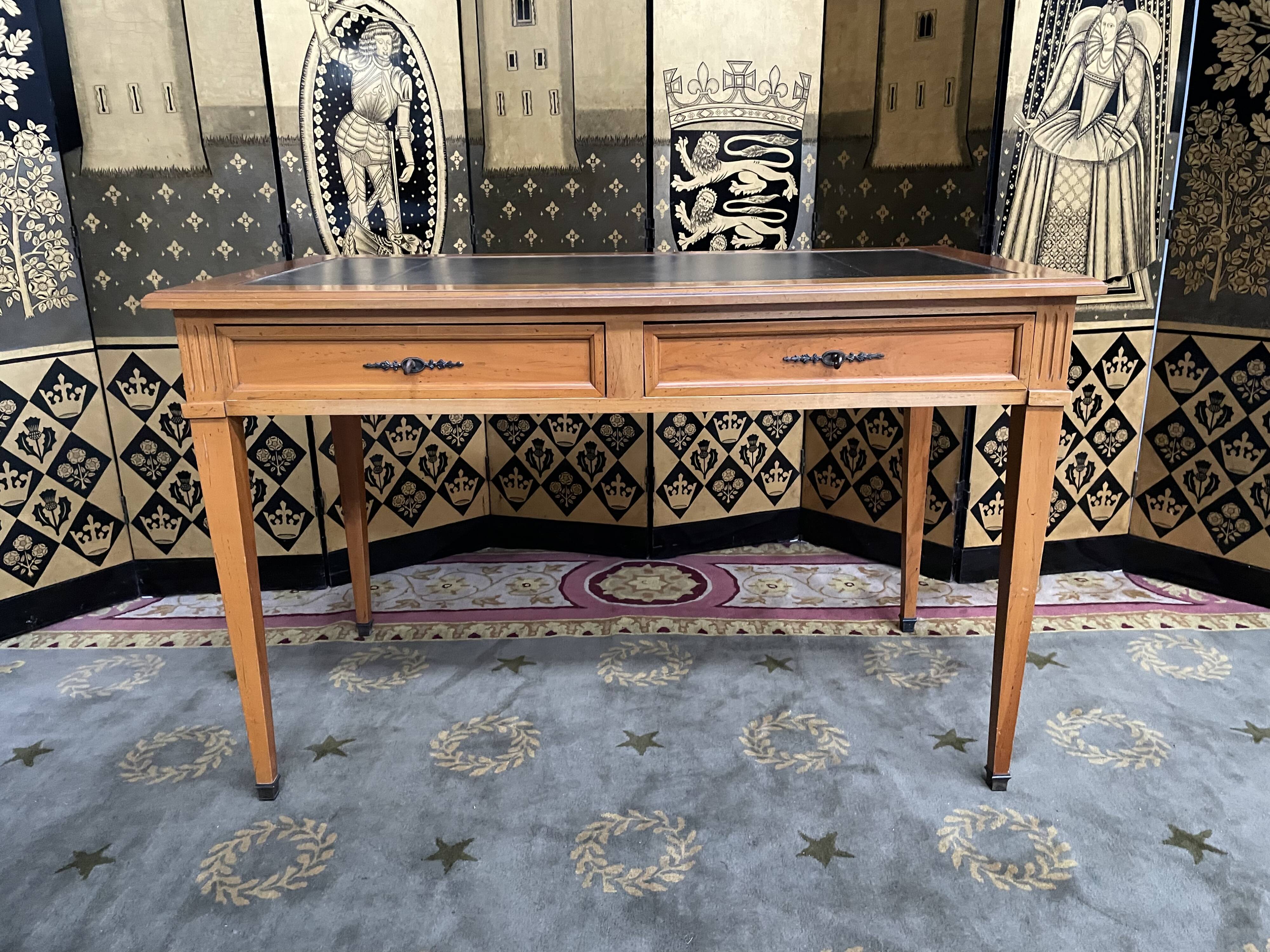 Desk full of Louis XVI style black leather
