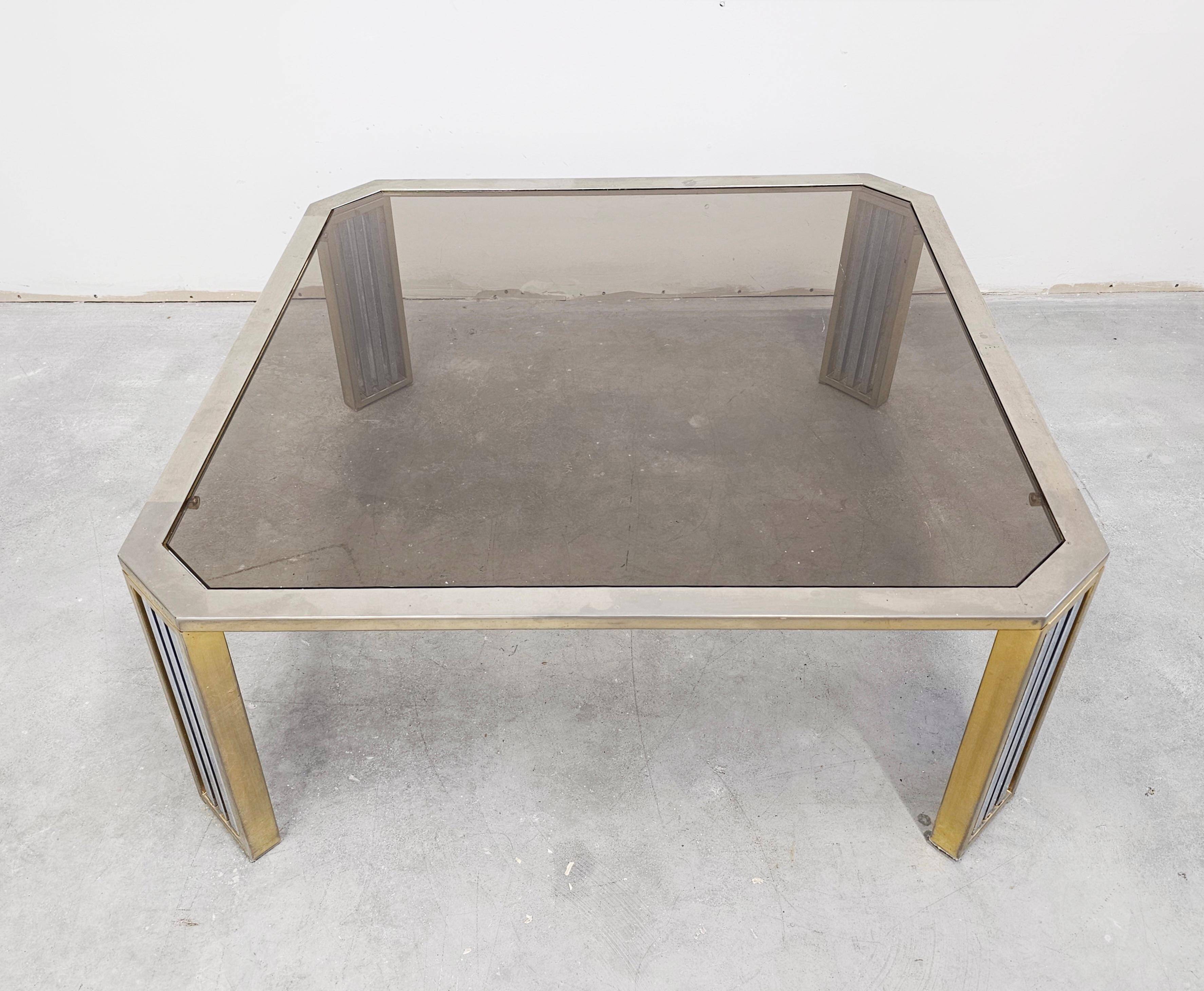 Large modernist coffee table attributed to Romeo Rega in steel and brass plating.