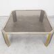 Large modernist coffee table attributed to Romeo Rega in steel and brass plating.