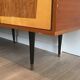 Designer sideboard with 4 doors in sapele mahogany and sycamore on a blackened wood base